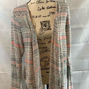 Maurice’s lightweight pastel cardigan